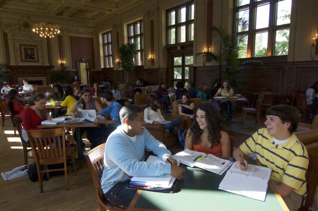 Students laugh in Holmes Lounge